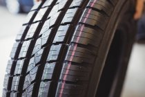 Close-up of car tyre in repair garage — Stock Photo