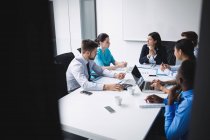 Team of doctors in a meeting at conference room — Stock Photo