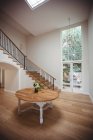 Interior of home with wooden floor and staircase with white walls — Stock Photo