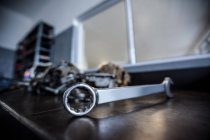 Close-up of wrench on table at repair garage — Stock Photo