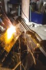 Sparks during metal welding in workshop — Stock Photo