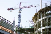 Crane and building construction site in daylight — Stock Photo