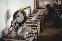 Circular saw machine on table in workshop — Stock Photo