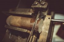 Close-up of machine cutting wood — Stock Photo