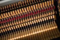 Close-up of piano strings in workshop, full frame — Stock Photo