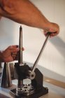 Close-up of goldsmith using mini drill press in workshop — Stock Photo