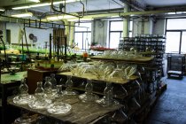 Empty glassware in workshop at glassblowing factory — Stock Photo