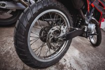 Close-up of motorbike parked in industrial mechanical workshop — Stock Photo