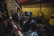 Various mechanic equipment on worktop at workshop — Stock Photo