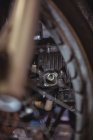 Close-up of motorbike engine in industrial mechanical workshop — Stock Photo