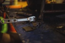 Close-up of tool at industrial mechanical workshop — Stock Photo