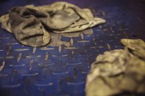 Close-up of rags at industrial mechanical workshop — Stock Photo