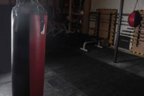 Punching bag for boxing or kick boxing sport in fitness studio — Stock Photo
