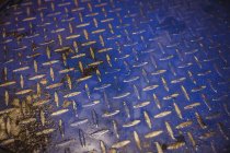 High angle view of hydraulic lift pattern in workshop — Stock Photo
