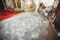 Close-up of ice bucket at bar counter — Stock Photo