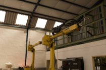 Современная роботизированная машина на складе — стоковое фото