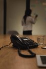 Close-up of landline on table in conference room — Stock Photo