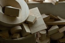 Close-up of wooden pieces in foundry workshop — Stock Photo