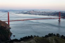 Beautiful photography of golden gate bridge with river at sunset — Stock Photo