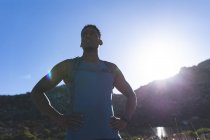 Portrait of fit african american man exercising outdoors in countryside. fitness training and healthy outdoor lifestyle. — Stock Photo