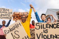 Diverse crowd of people holding placard at protest march. equal rights and justice protestors on demonstration march. — Stock Photo