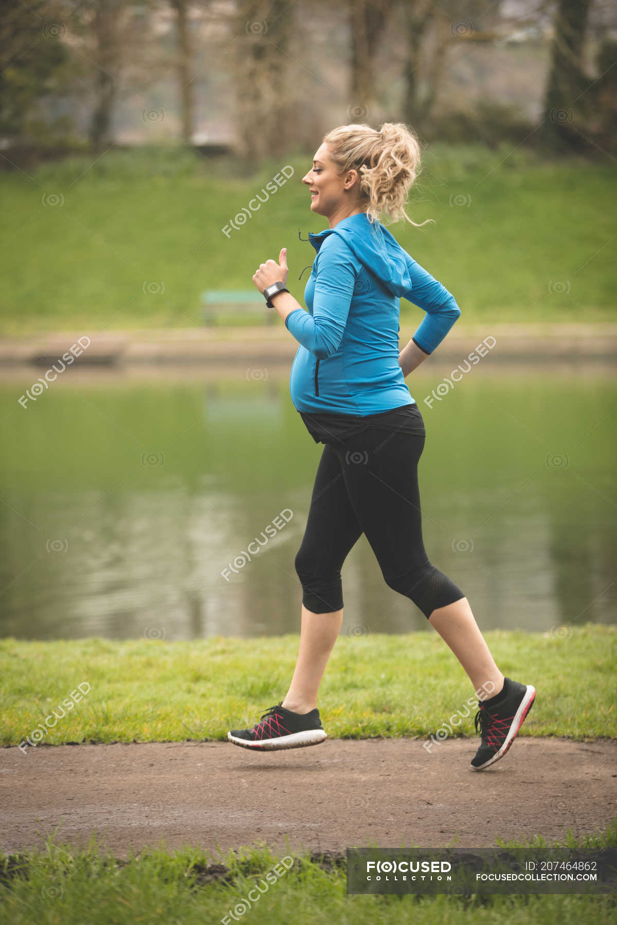 Beautiful Pregnant Woman Jogging In The Park Outdoors Fitness Stock Photo 207464862