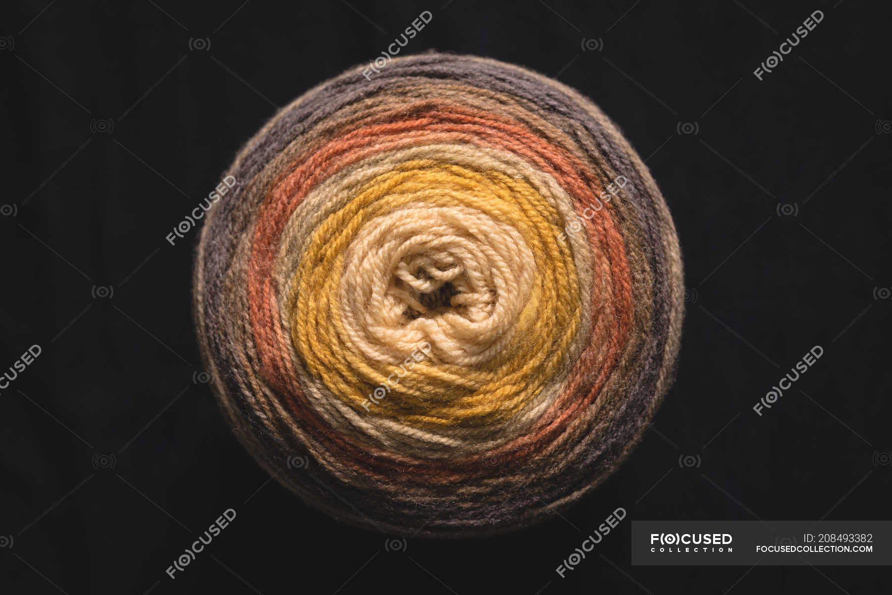 Close-up of yarn on black background — knit, textile industry - Stock