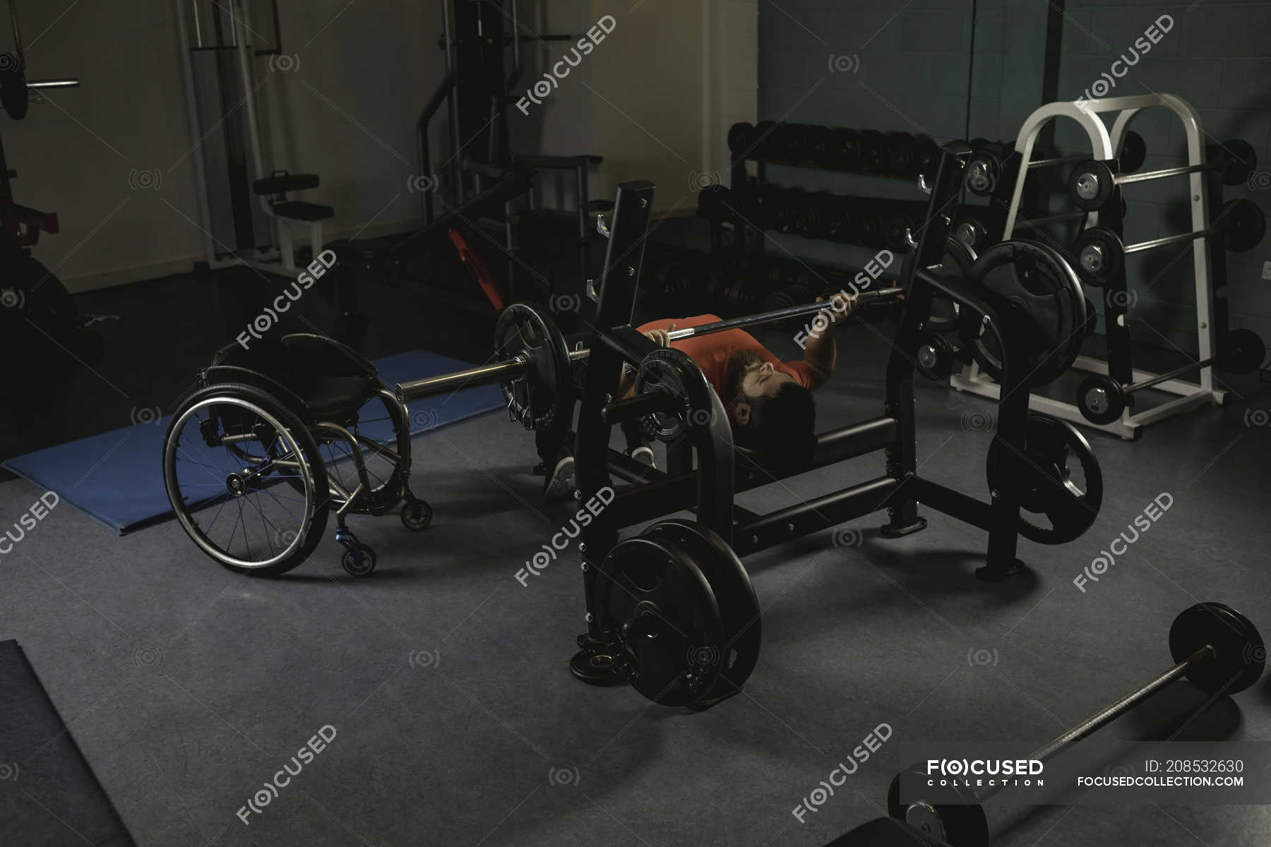Handicapped Man Doing Chest Workout On Bench Press With Barbell In