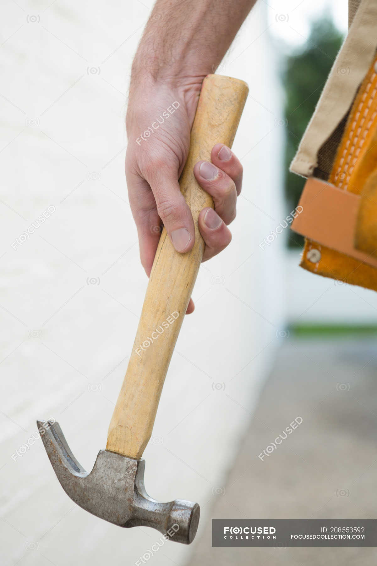 Close-up of male carpenter hammer — Expertise, Part - Stock Photo | #208553592