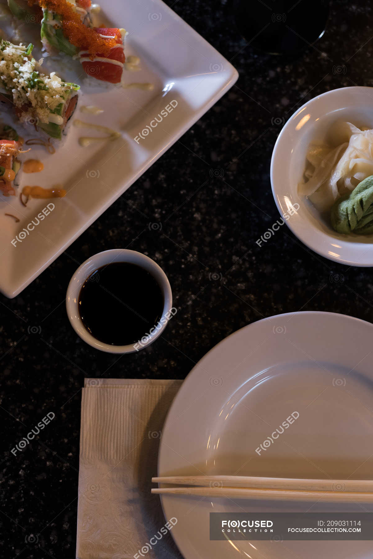 Sushi table arranged in a restaurant on a sunny day — appetizer, susi ...