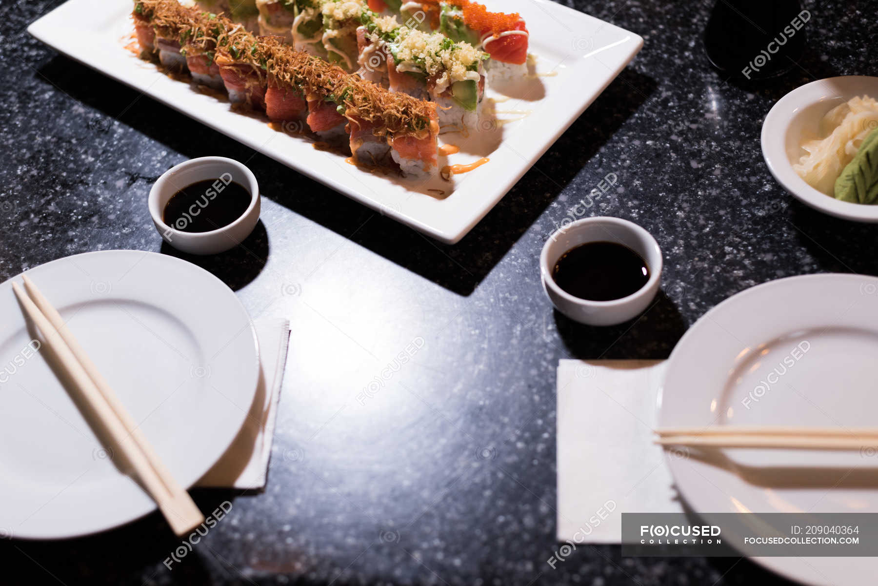 Sushi table arranged in a restaurant on a sunny day — Variety ...