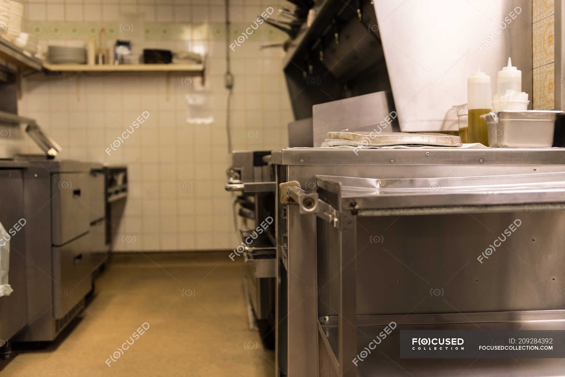 Interior of commercial kitchen in an restaurant — oil storage, food