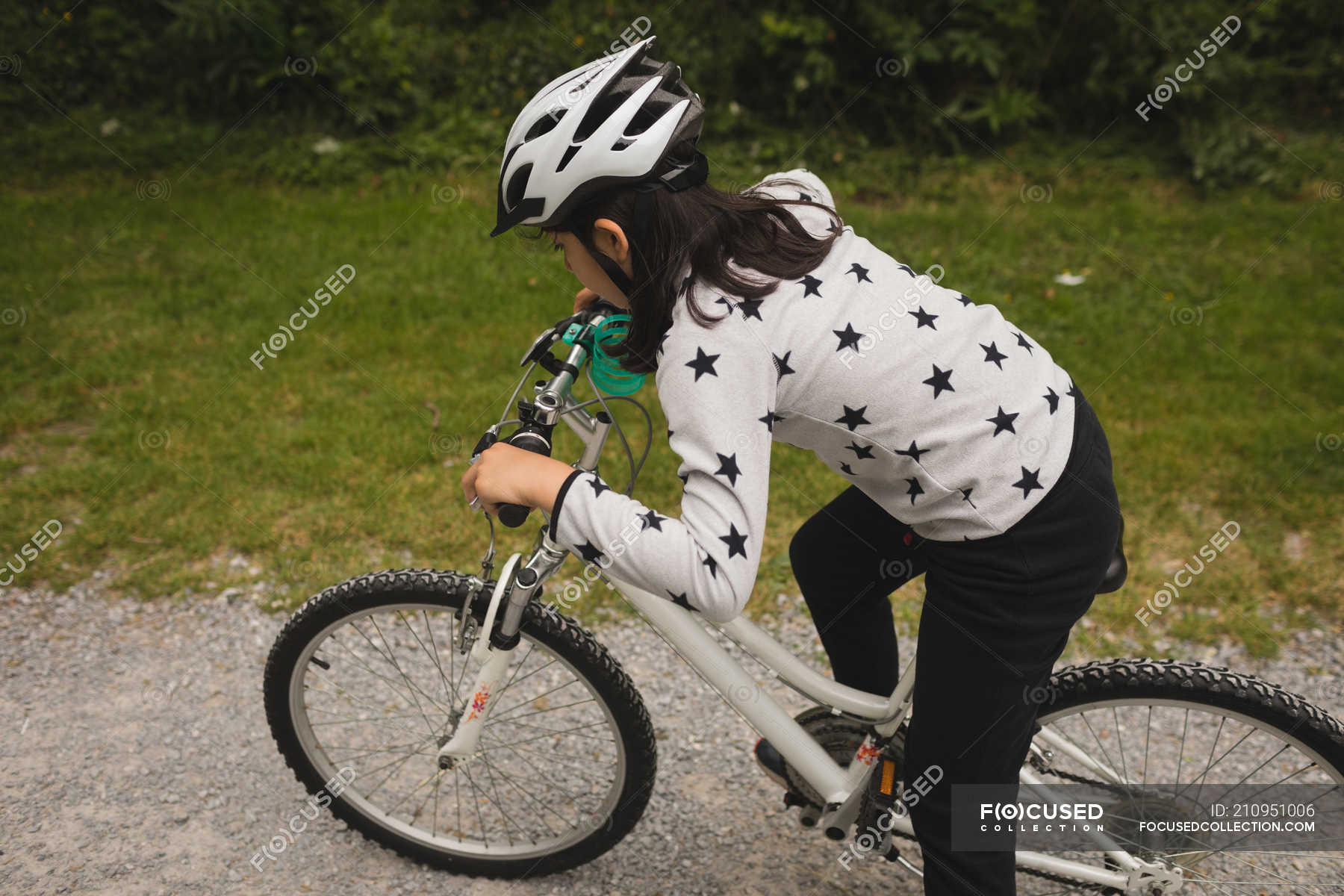 girl riding bicycle
