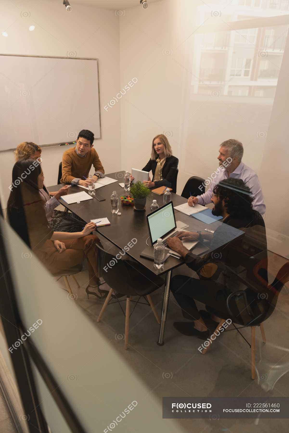 Officials in a meeting room
