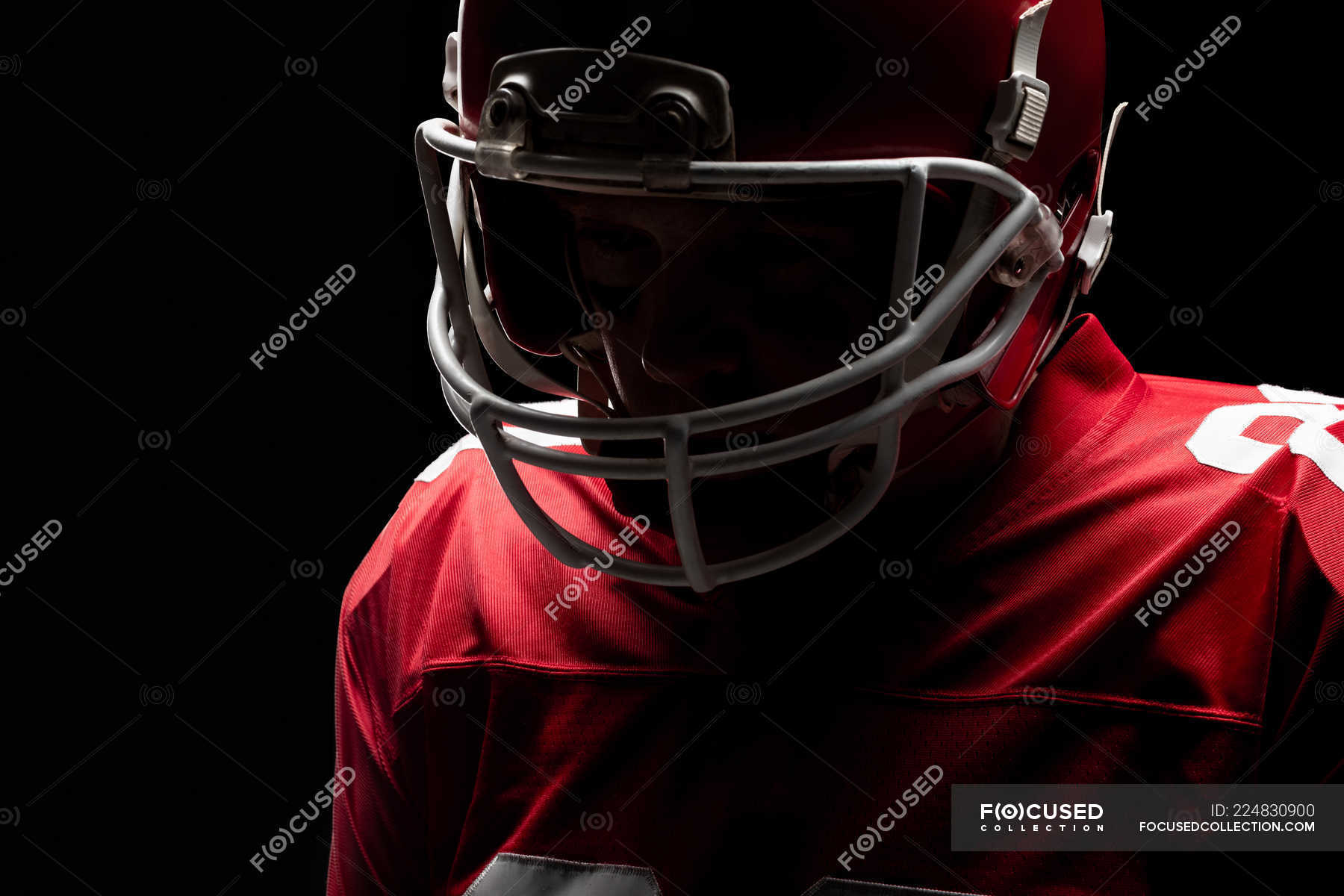 Close Up Of American Football Player Standing With Rugby Helmet Confidence Sportswear Stock Photo