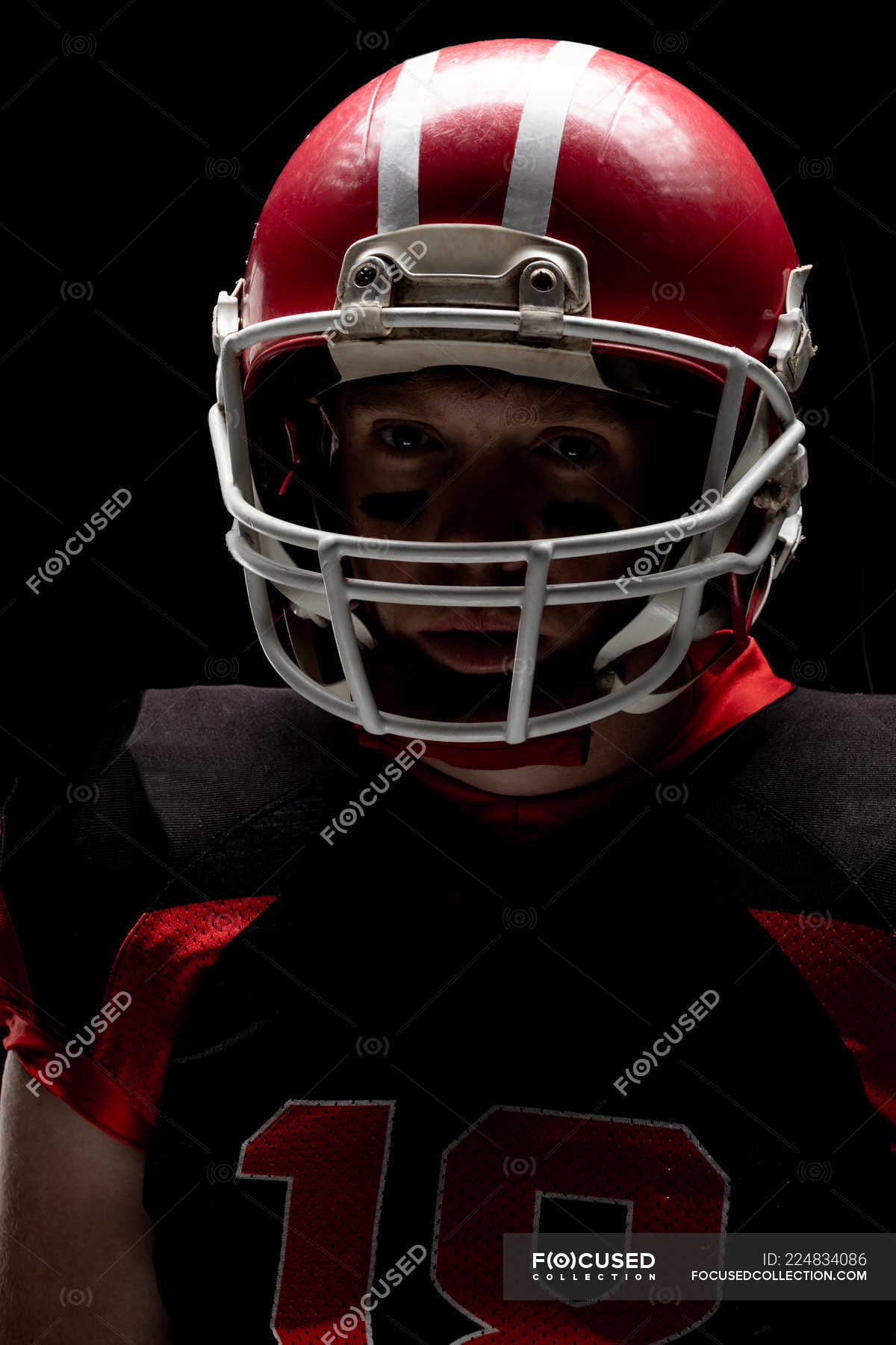 Close Up Of American Football Player Standing With Rugby Helmet Safety Occupation Stock Photo