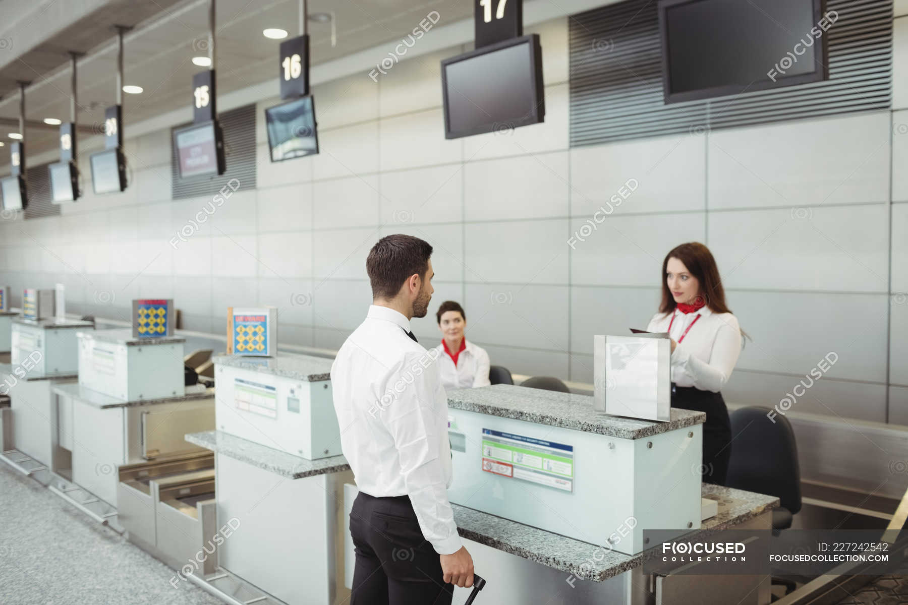 Check in desks Stock Photos, Royalty Free Images Focused