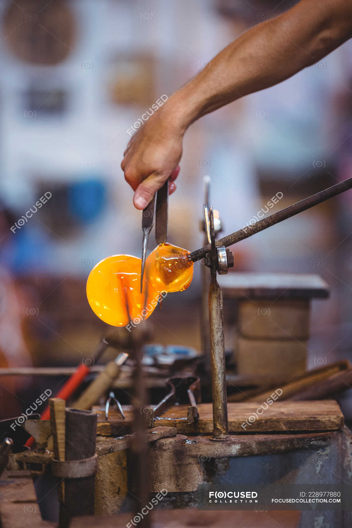 Hand Of Glassblower Shaping A Molten Glass At Glassblowing Factory — Blowpipe Profession