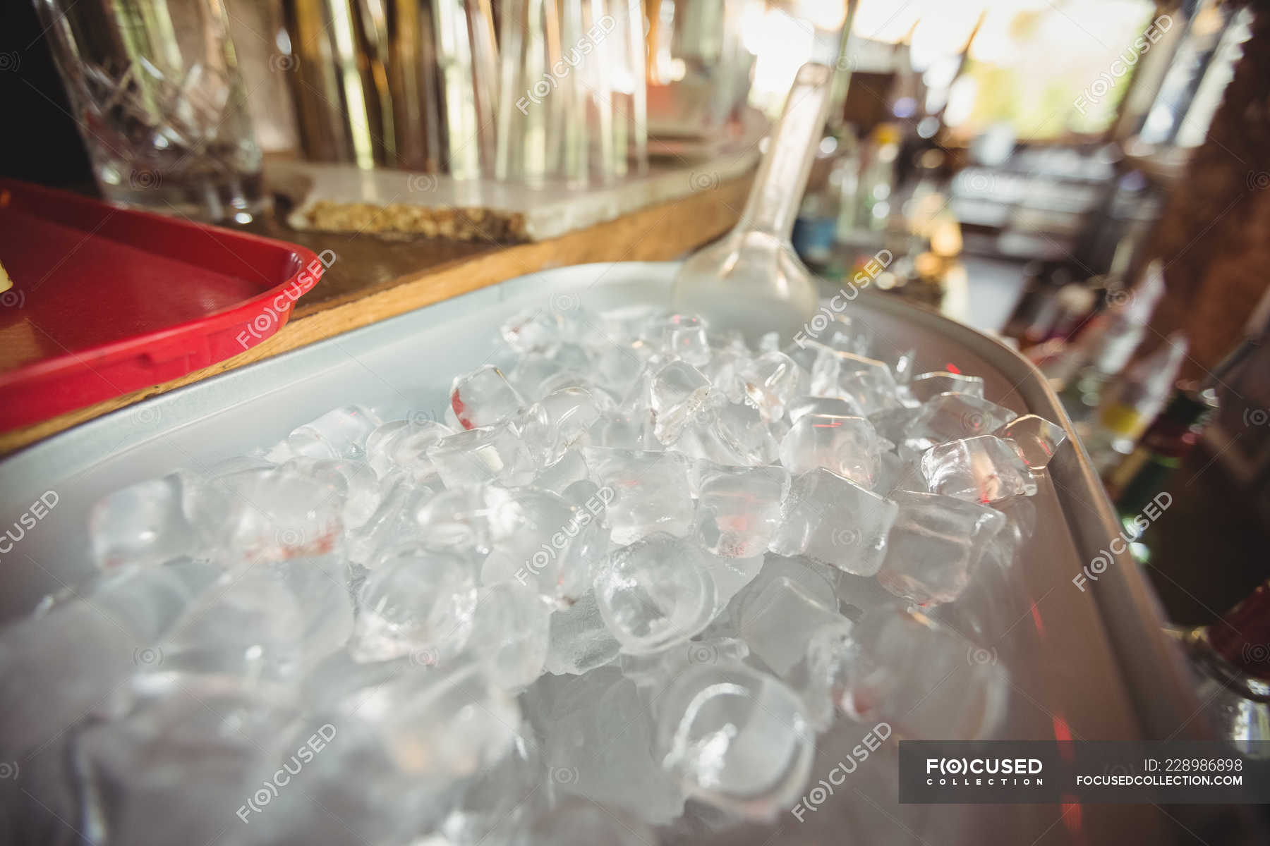Closeup of ice bucket at bar counter — frozen, handle Stock Photo 228986898