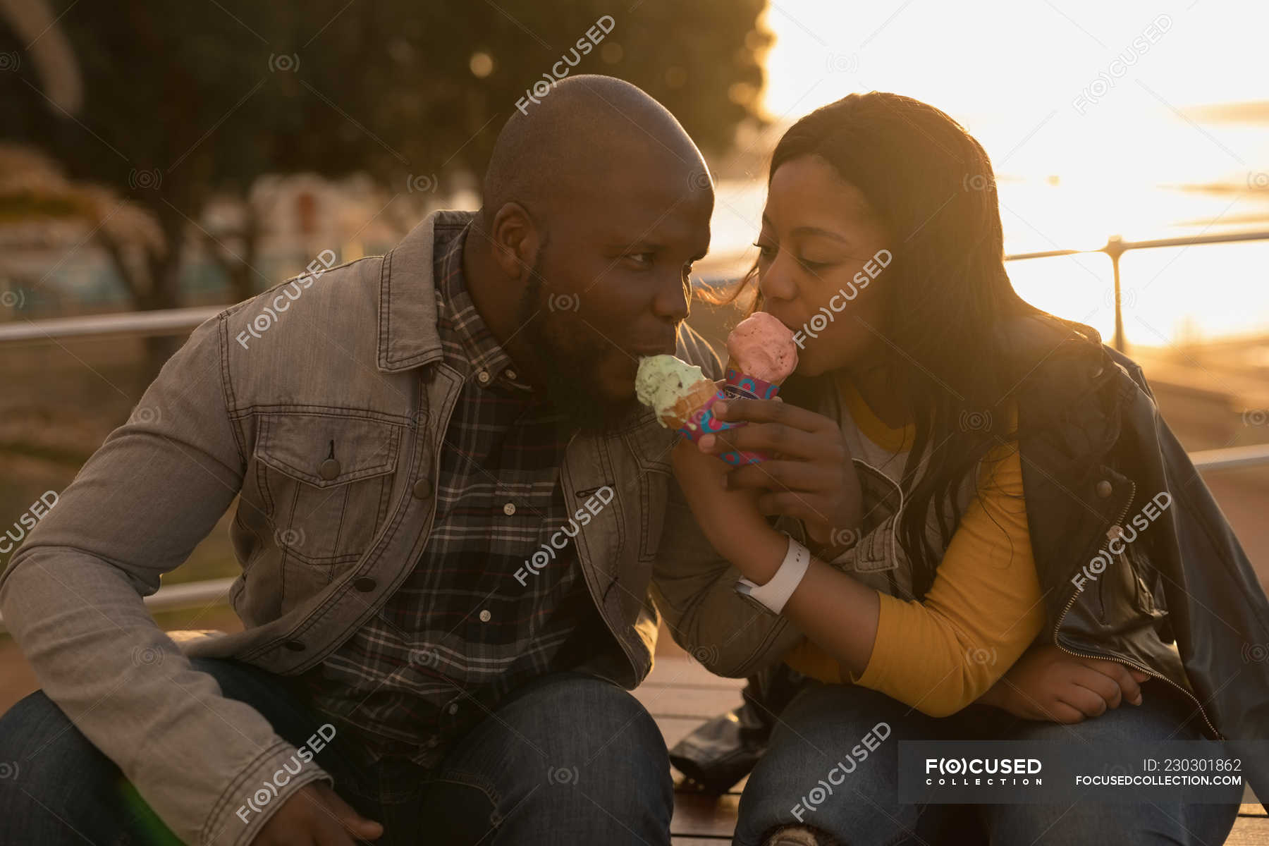 Romantic Couple Having Ice Cream On Promenade Bench Prosthetic Leg Romance Stock Photo 230301862