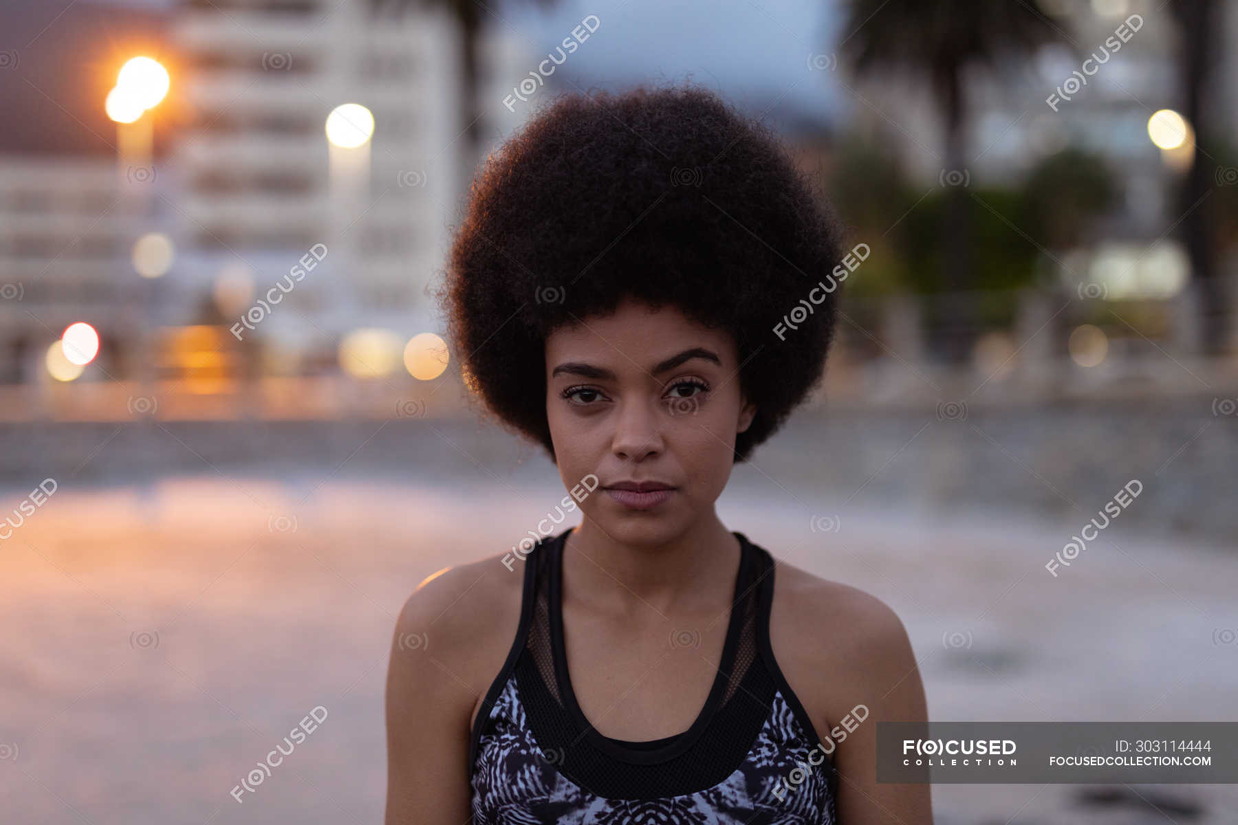 Portrait Close Up Of A Young Mixed Race Woman Wearing Sports