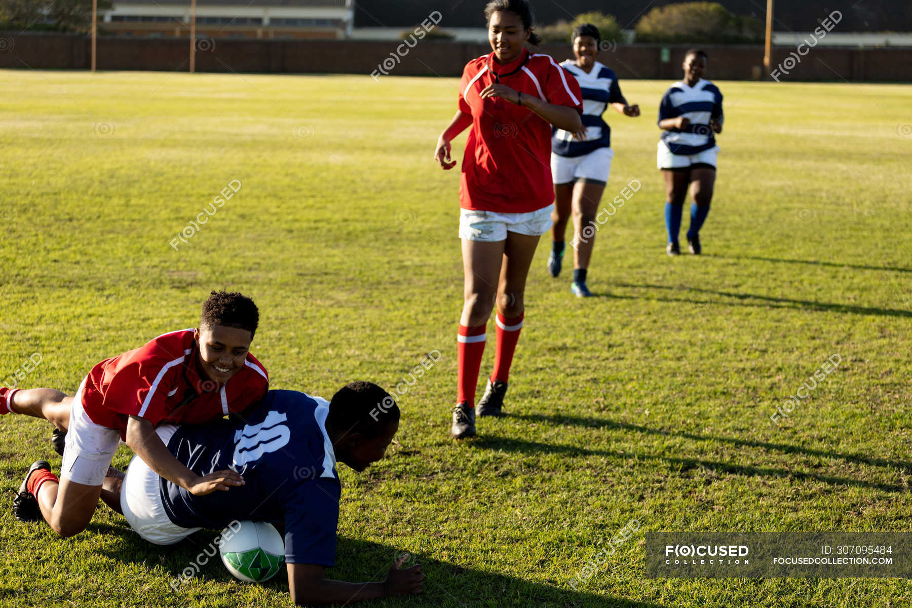 front-view-of-a-group-of-young-adult-multi-ethnic-female-rugby-players