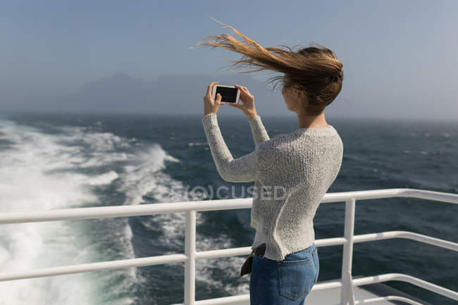 Woman selfie with mobile phone on cruise ship — Stock Photo