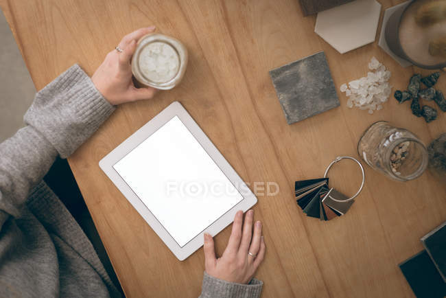 Overhead of executive using digital tablet in office — Stock Photo