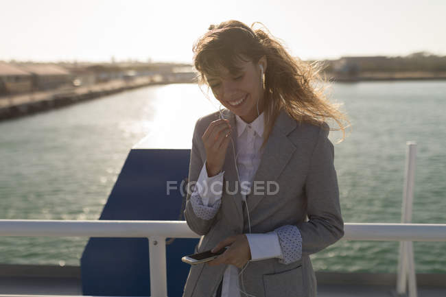 Beautiful woman talking on mobile phone — Stock Photo