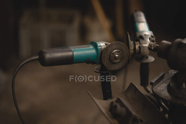 Close-up of grinder machine in workshop — Stock Photo