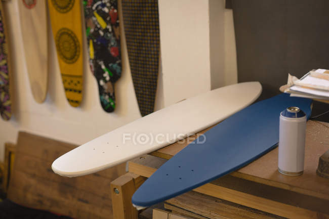Various skateboards in workshop — Stock Photo