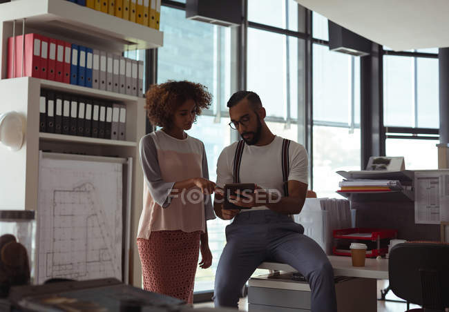 Architects discussing over digital tablet in the office — Stock Photo