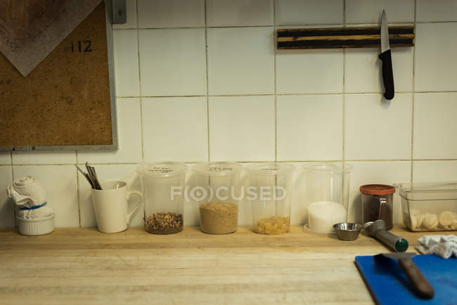Various species arranged in jar at kitchen — Stock Photo