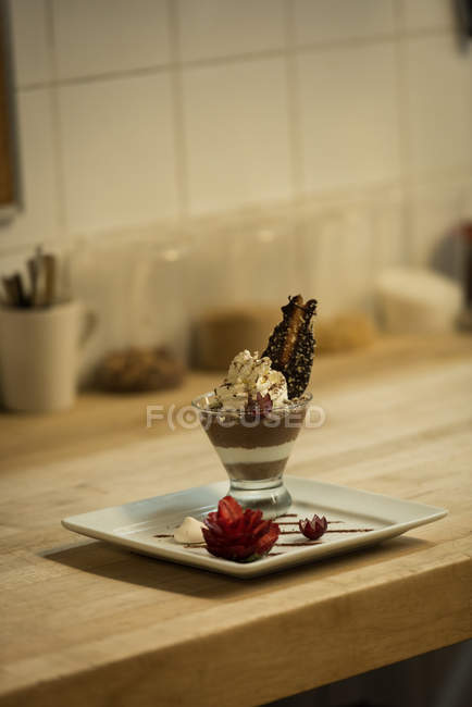 Ice cream served in a plate at kitchen — Stock Photo
